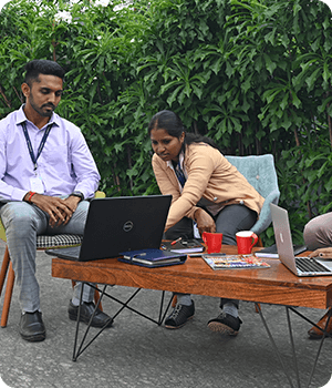 Open workspace — natural light, green surroundings